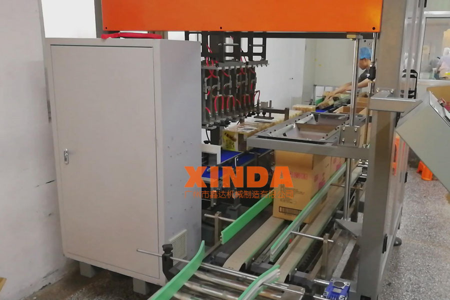 沙琪瑪食品使用鑫達機械全自動伺服裝箱機案例視頻